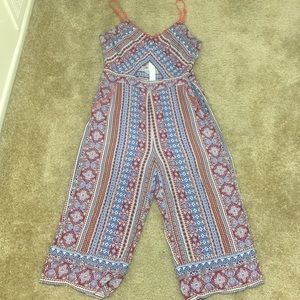 Capri length jumpsuit. Size: Large